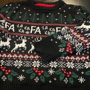 Black Holiday Sweater with Festive Patterns
